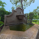 Close-up of the Andalusia Fountain showing water cascading from the upper bowl into the basin