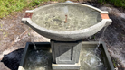 Overhead view of the Austin Fountain featuring the circular upper basin and four evenly spaced copper spillways