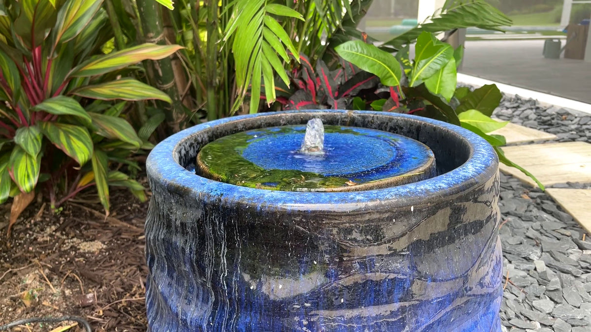 Close-up of Rumba Fountain showing Riviera Blue glaze and gently bubbling water