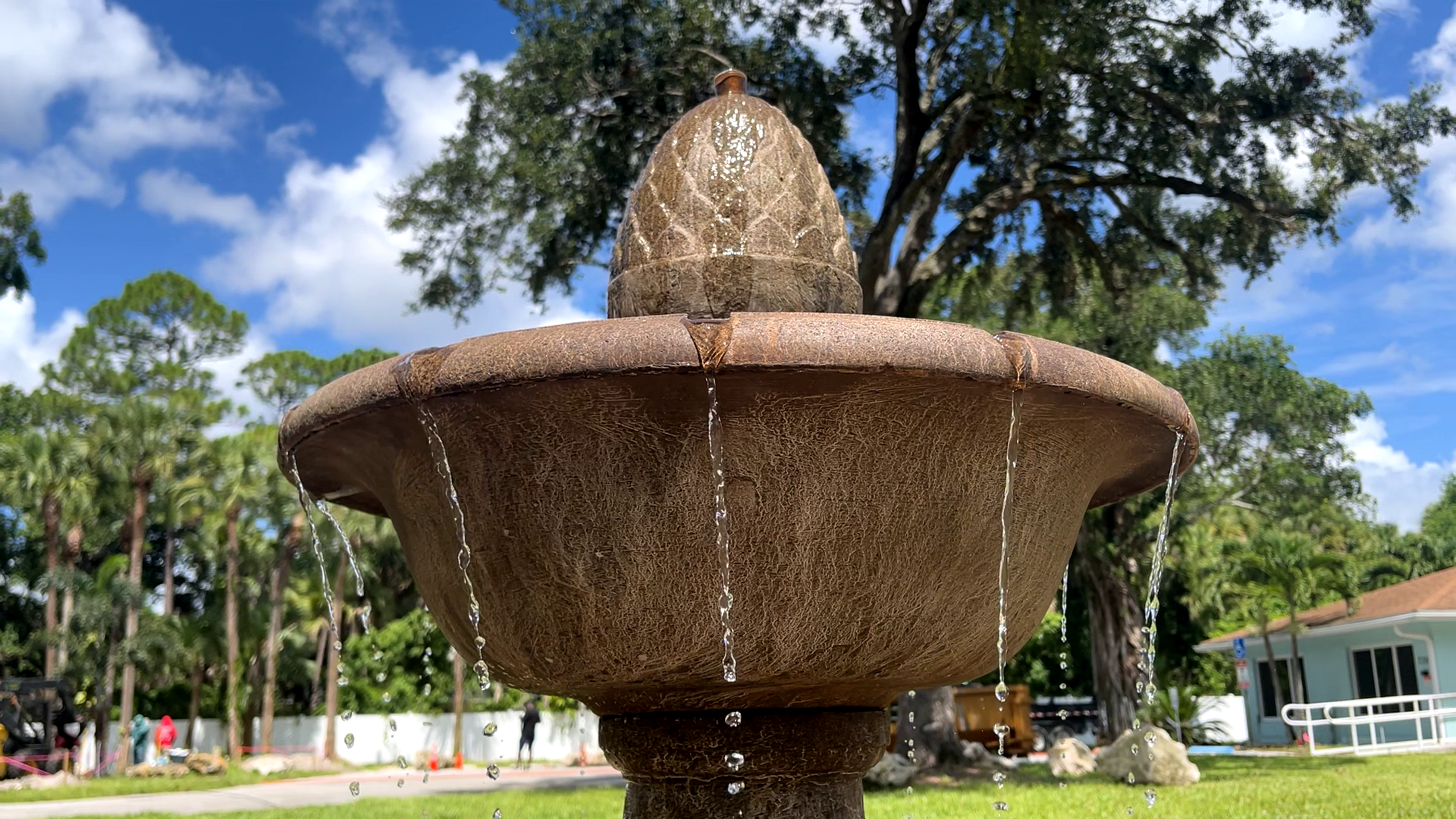 Close-up of the Wiltshire Fountain's upper basin with water spilling evenly into the lower basin