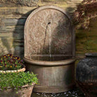 Corsini Wall Fountain outdoor garden fountain in Aged Limestone finish