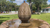 Wiltshire Fountain with cascading water in a landscaped outdoor setting