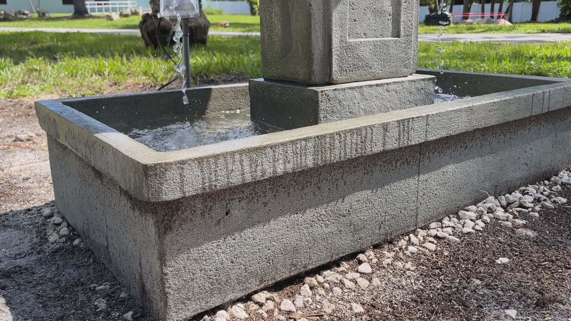 Austin Fountain with cascading water in a landscaped outdoor setting