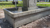 Austin Fountain with cascading water in a landscaped outdoor setting