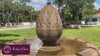 Wiltshire Fountain with cascading water in a landscaped outdoor setting