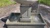 Stone outdoor garden fountain collection with flowing water, showcasing the handcrafted fountains available at Backyard Charm Boutique.